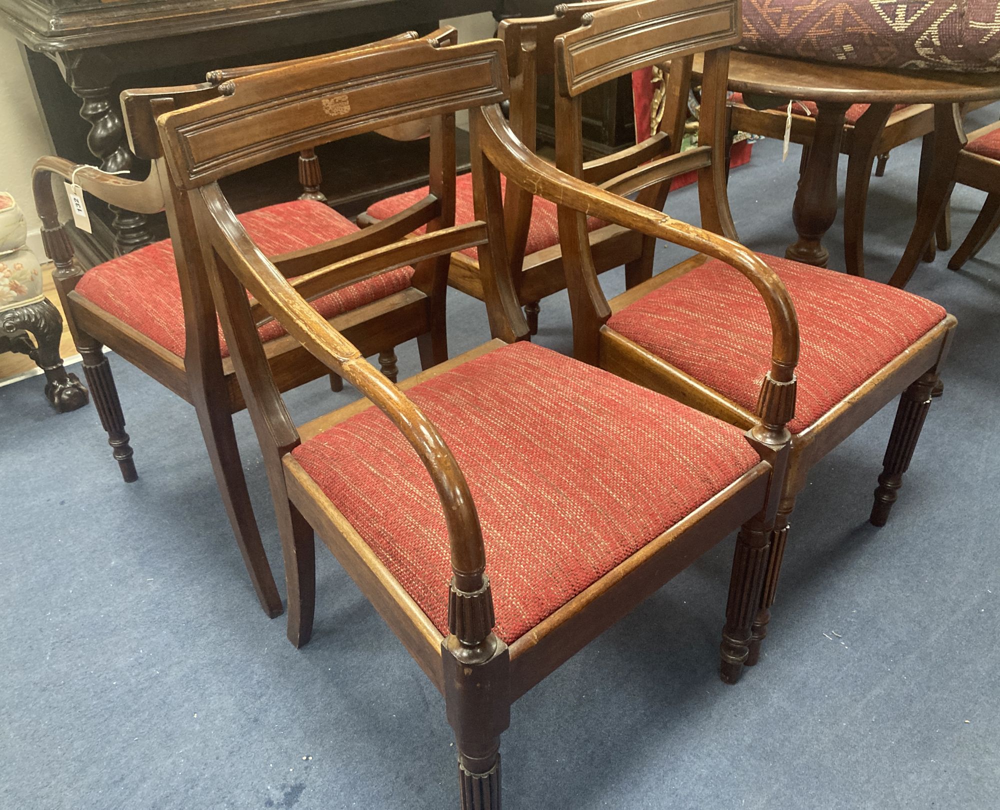 A set of eight Regency style mahogany dining chairs (two with arms)